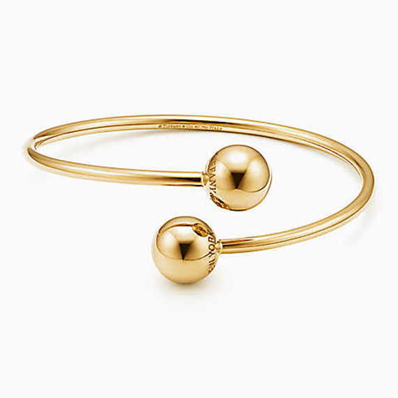 Joyas Tiffany&Co pulsera cruzada esfera oro