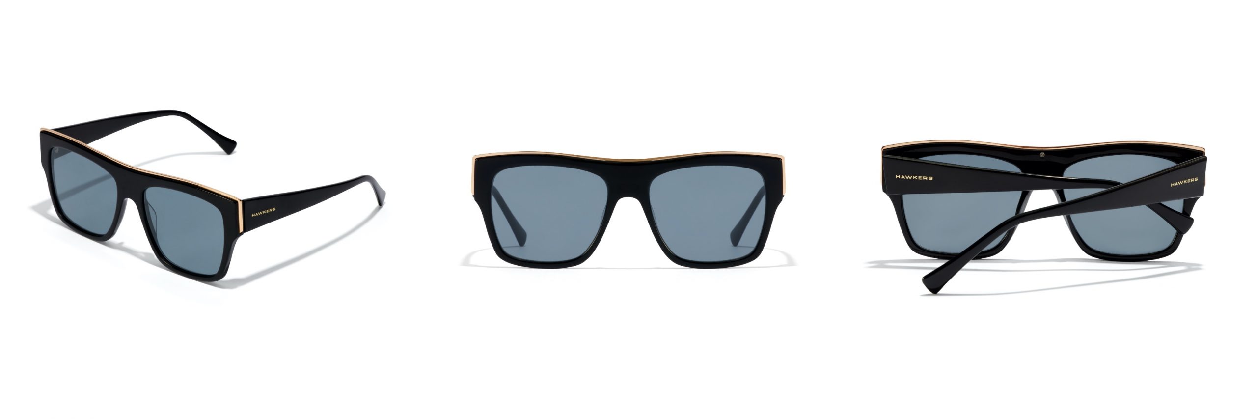 Modelo de gafas Doumu Metal de Hawkers. Cuenta con montura de acetato y lentes de color negro mas una tira metálica en la parte superior frontal.
